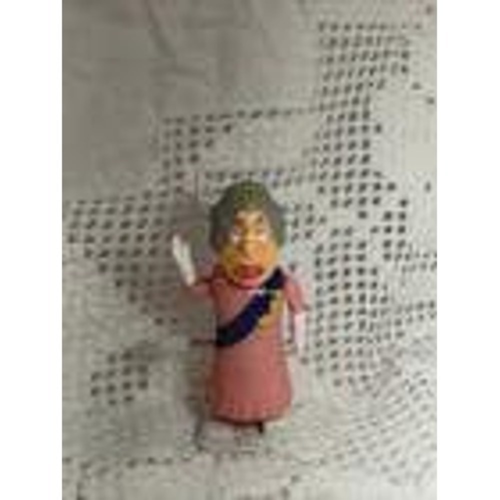 Queen Elizabeth II Racing Royals wind-up toy- Working condition